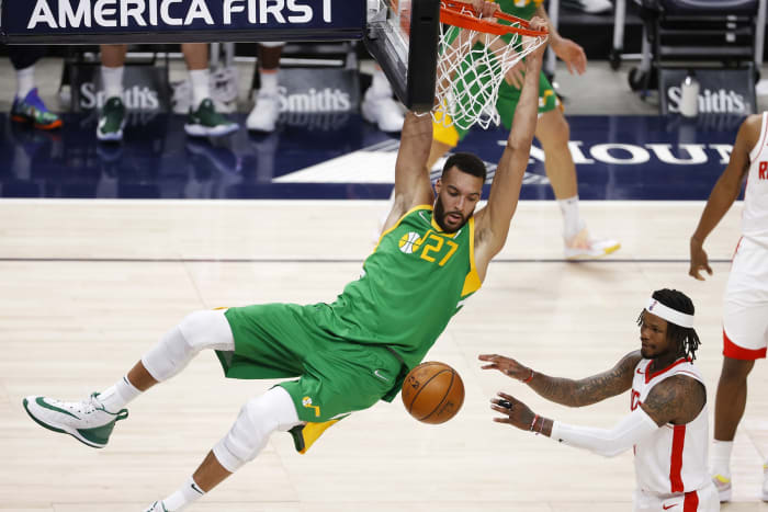 Rudy Gobert (27) finishes with a two-handed slam over the Houston Rockets